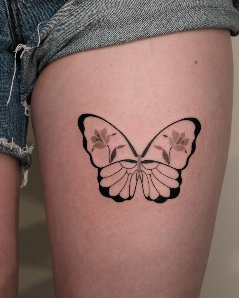 Stunning lily butterfly on the thigh a floral masterpiece
