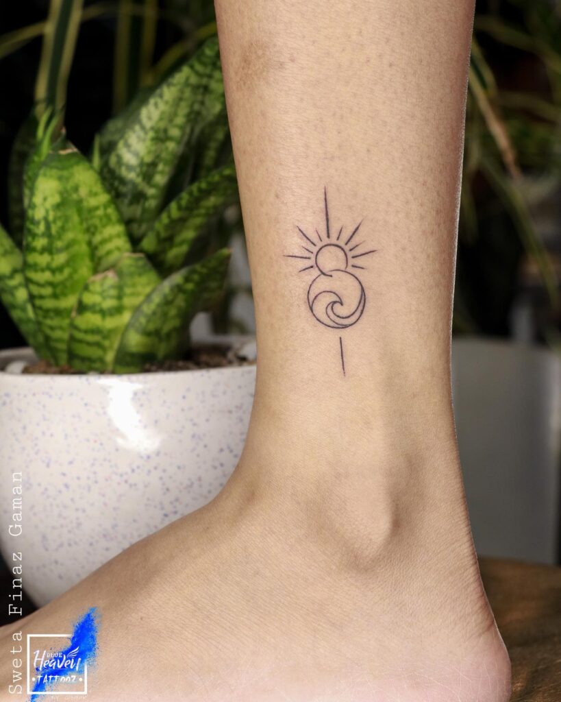 Stunning sun wave tattoo above the ankle