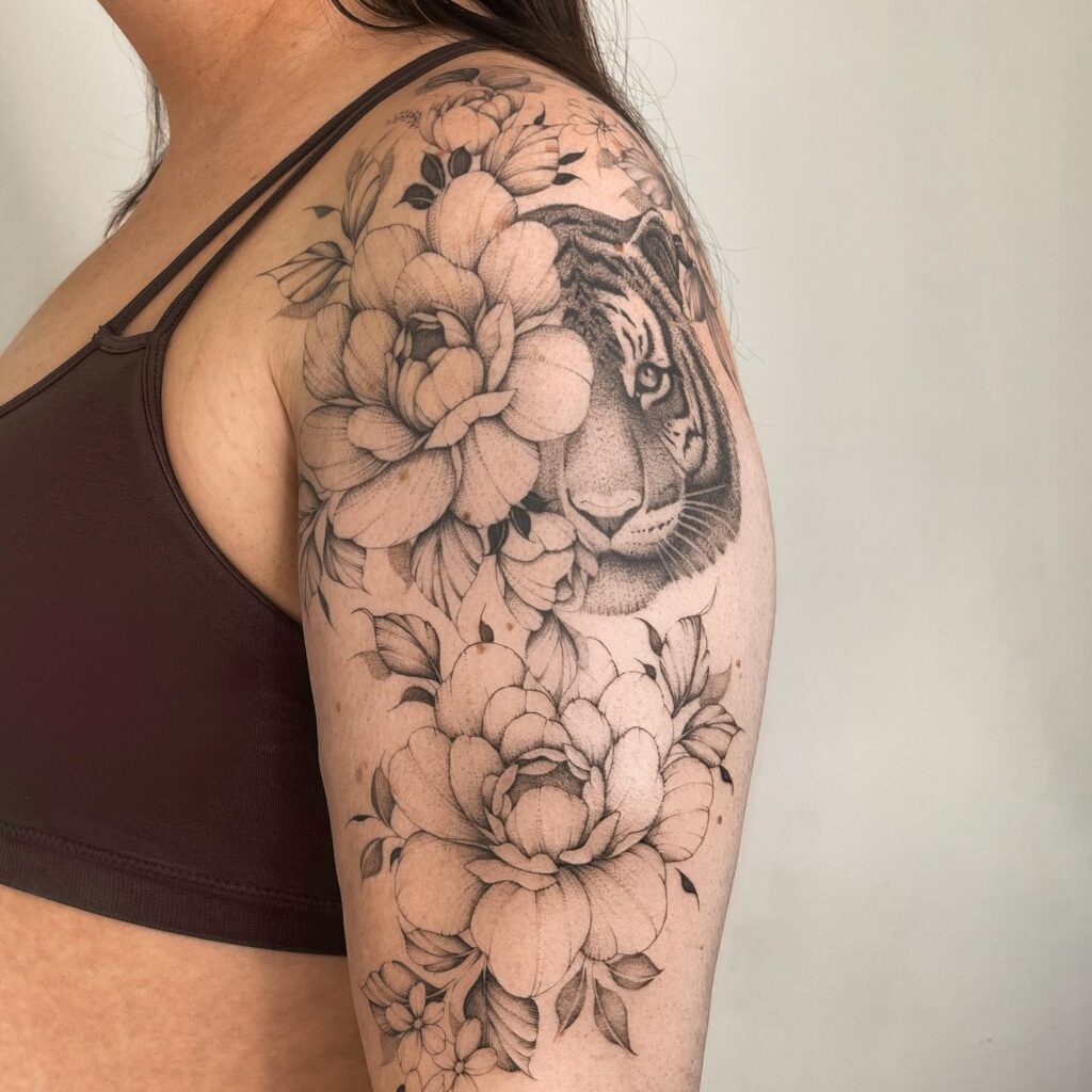 Stunning tiger and floral half sleeve a bold statement for women