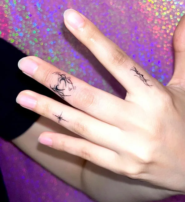 Succubus tattoo on finger