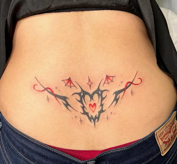 Succubus tattoo on lower back