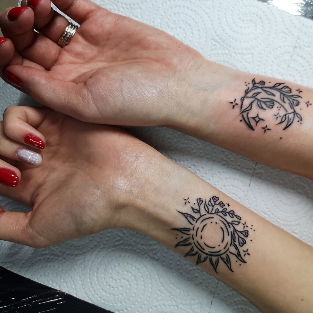 Sun and Moon Mother Daughter Tattoos Symbolizing Guidance and Love
