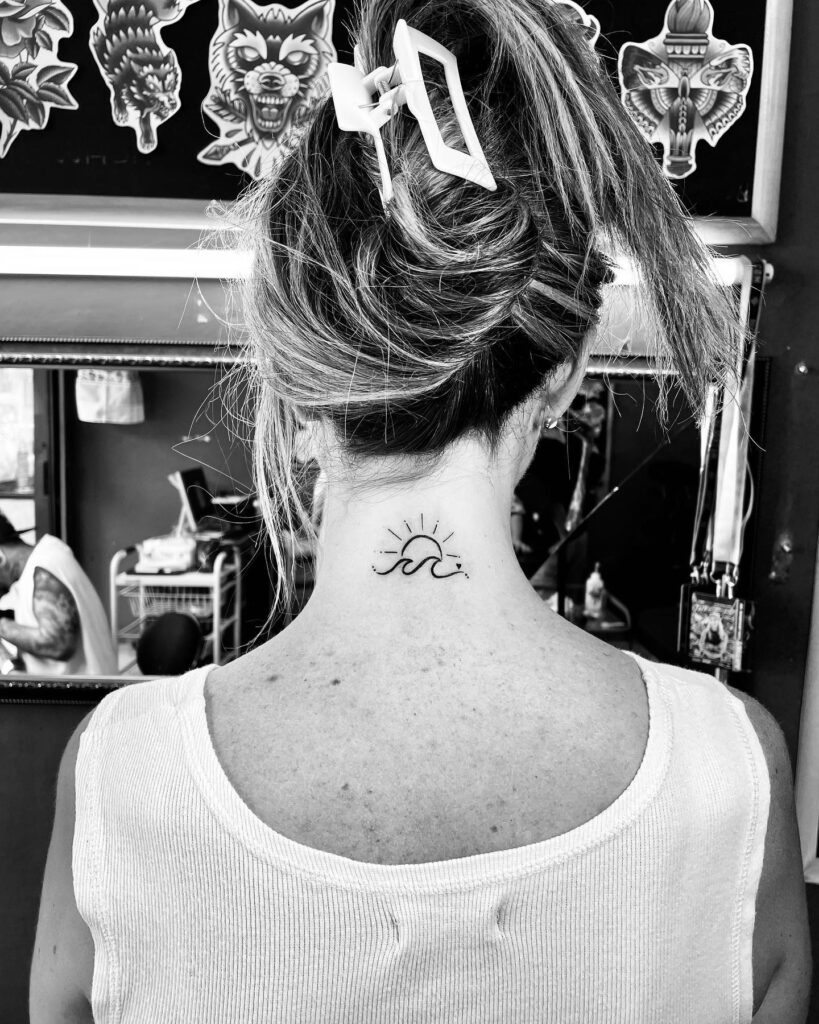 Sun and Wave Neck Tattoos: Elegant Concepts for Women