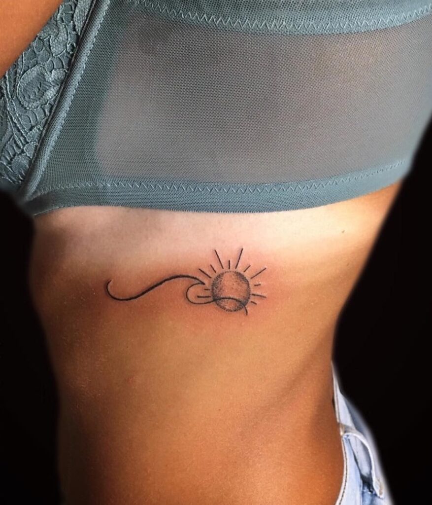 Sun and wave waist side stomach tattoo ideas for females creative and unique designs