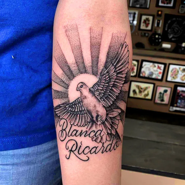 Sun with rays dove tattoo