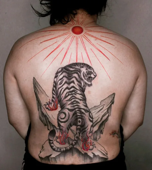 Sun with rays tattoo 10