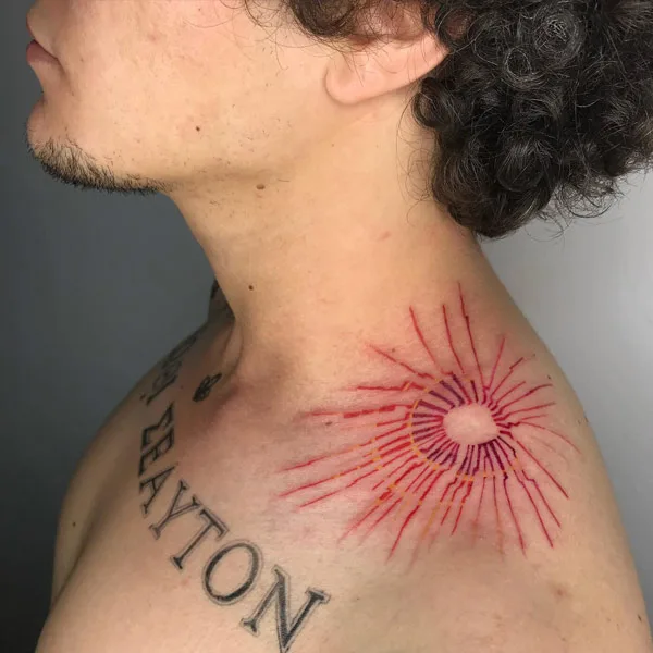 Sun with rays tattoo 14