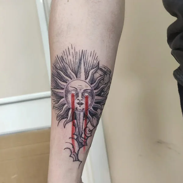 Sun with rays tattoo 15