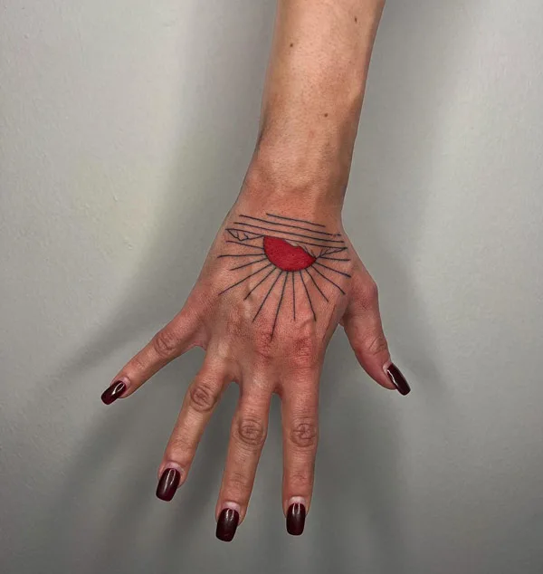 Sun with rays tattoo 23