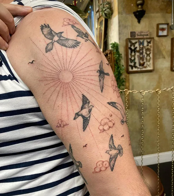 Sun with rays tattoo 31