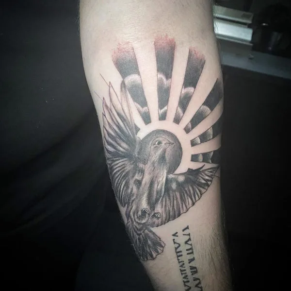 Sun with rays tattoo 40