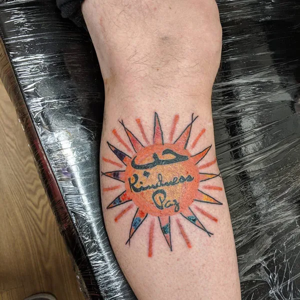 Sun with rays tattoo 6