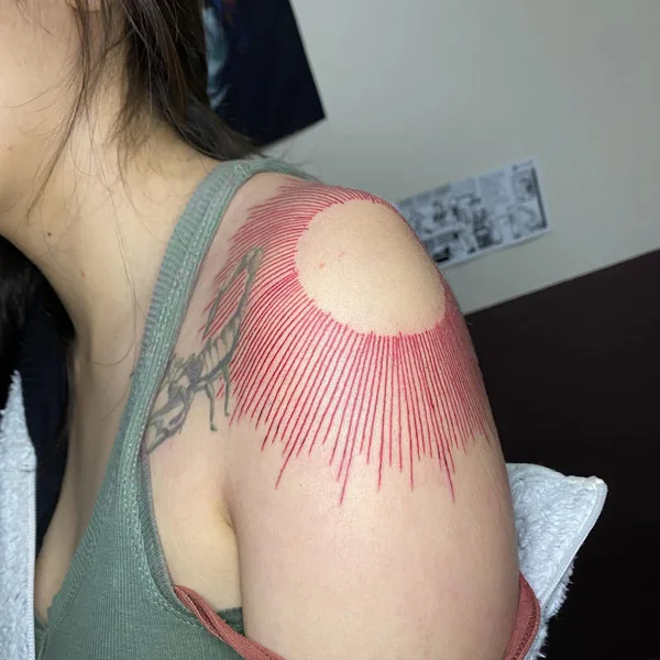 Sun with rays tattoo 9