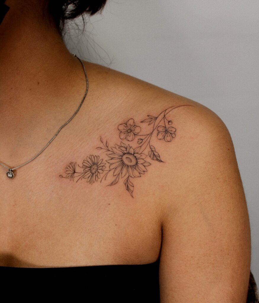 Sunflower, aster, and hawthorne collarbone adornment for a feminine touch floral trio