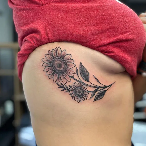 Sunflower side boob tattoo
