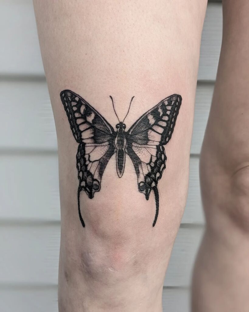 Blackwork Swallowtail butterfly Tattoo Above the Knee