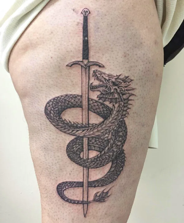 Sword Dragon tattoo on thigh