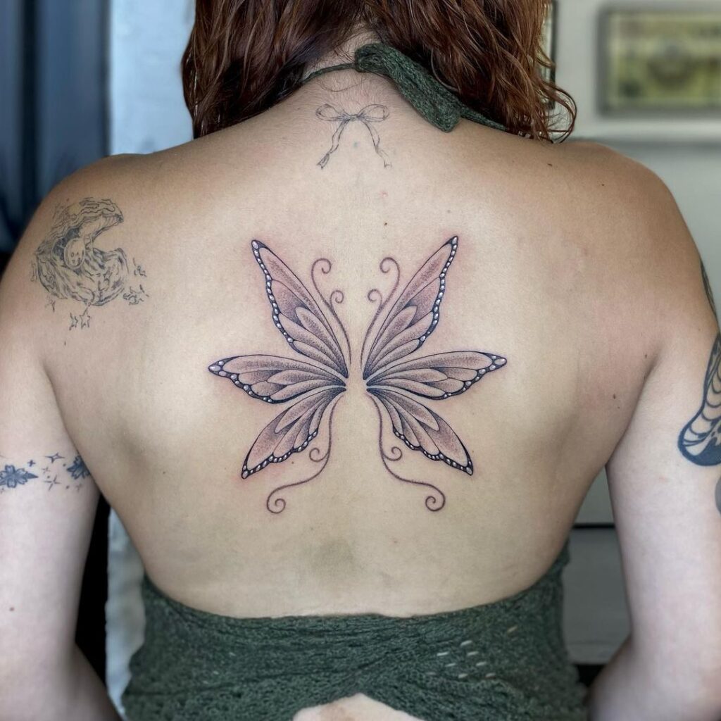 Symbol of transformation fairy wings on the back