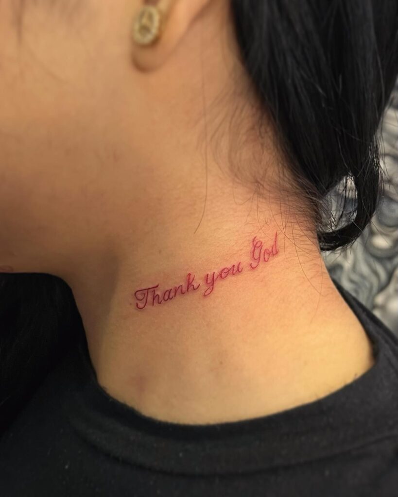 'Thank You God' Small Red Lettering Tattoo on the Side of the Neck: Divine Appreciation
