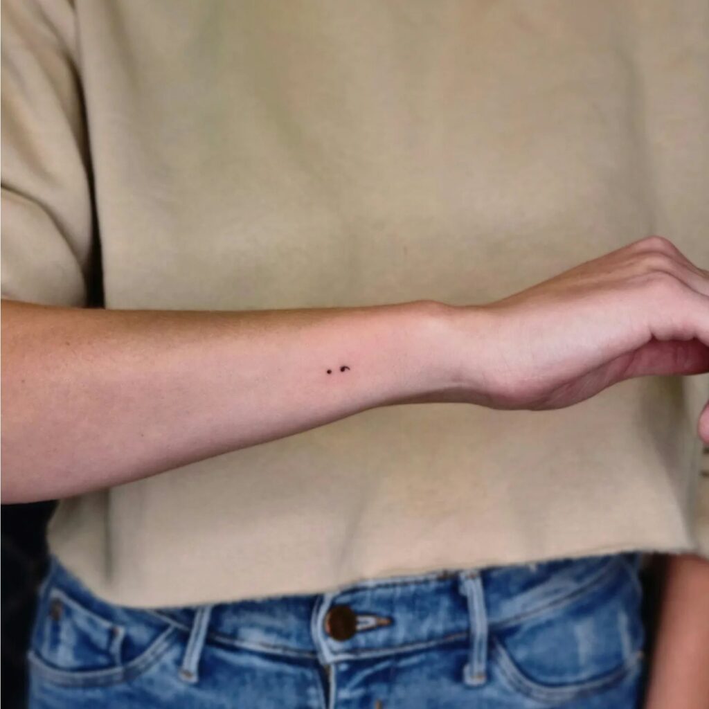The Teeniest Semicolon Tattoo on the Side of the Forearm: Teeny-Tiny Statement