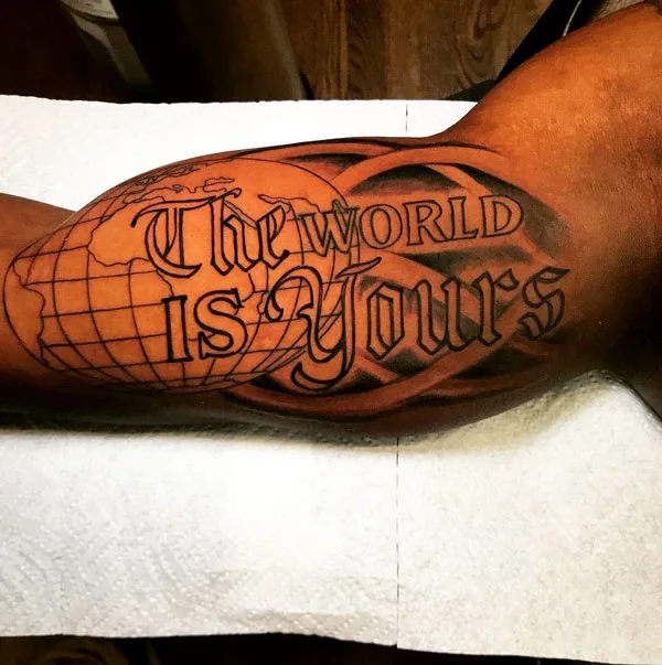 The world is yours bicep tattoo
