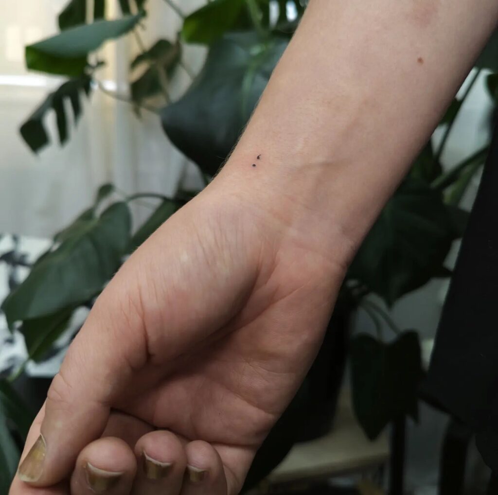 Tiniest Semicolon Tattoo on the Wrist: Subtle Power