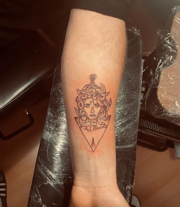 Tiny Medusa tattoo