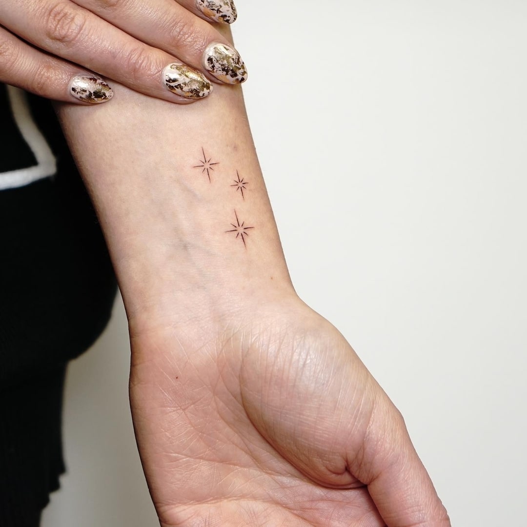 Tiny Delicate Star Tattoo on Wrist Elegant and Minimalist Celestial Design for Women