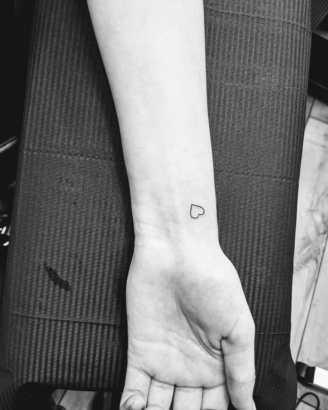 Tiny Heart Outline Wrist Tattoo Elegant and Simple Symbol of Love
