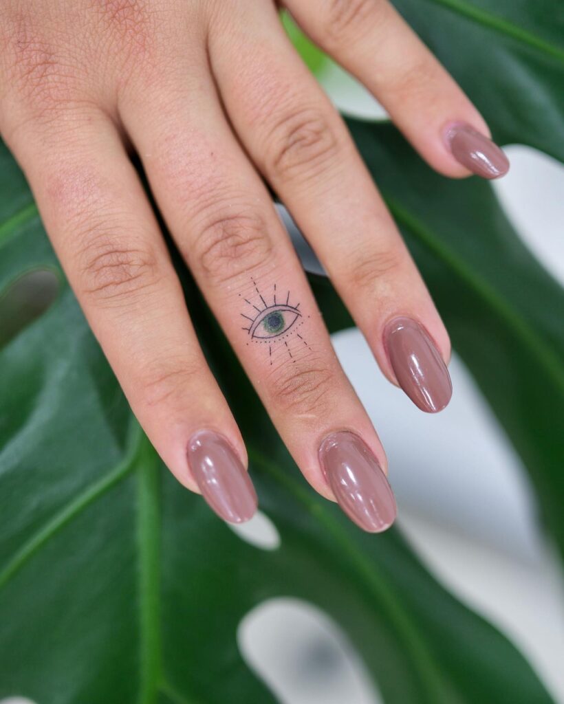 Tiny illuminati all seeing eye tattoo a mysterious middle finger adornment for girls