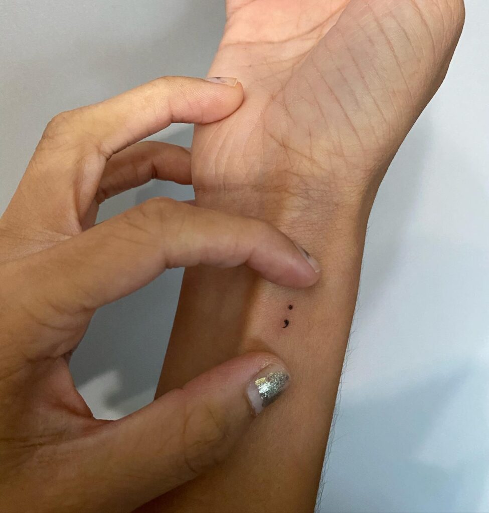 Tiny Semicolon Tattoo on the Inner Wrist for Females: Dainty Reminder