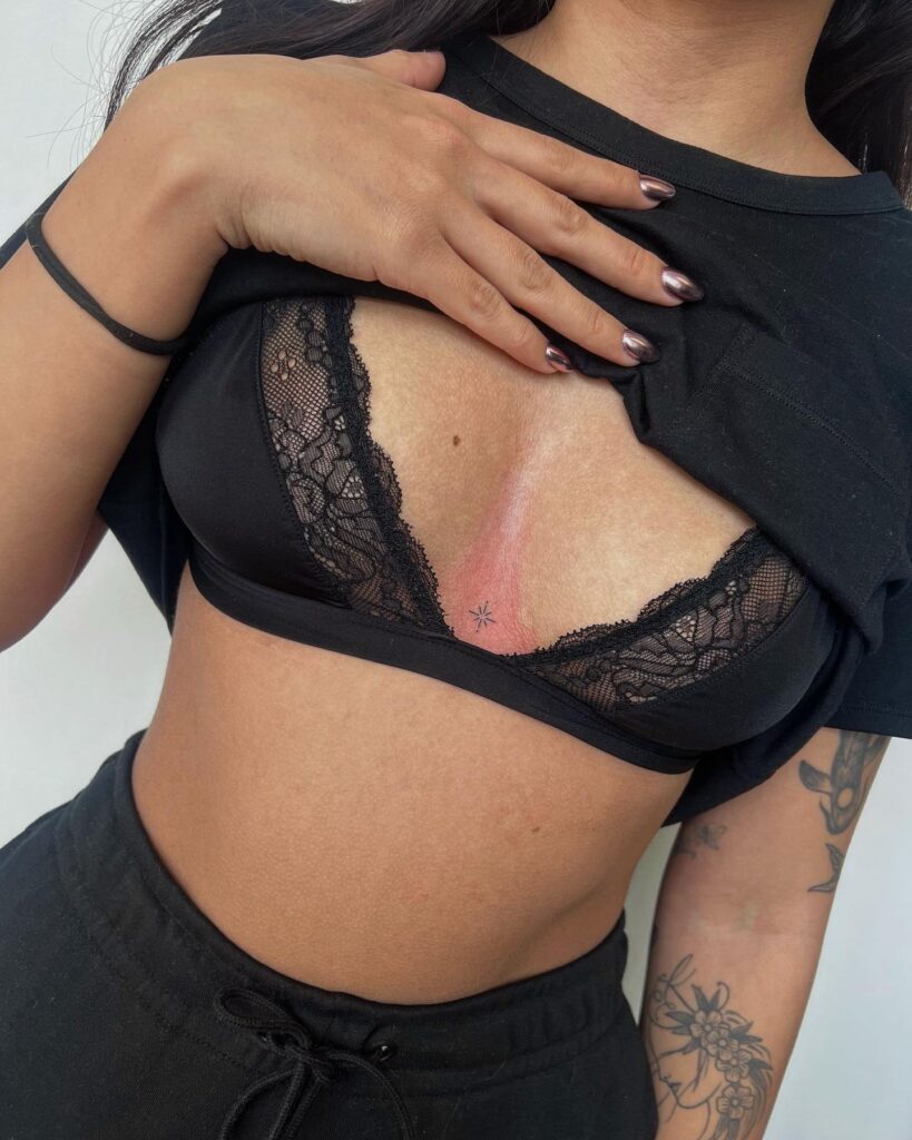 Tiny sparkle between the boobs subtle and elegant single sparkle