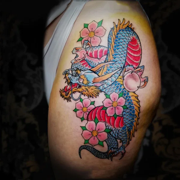 Traditional Dragon tattoo on thigh