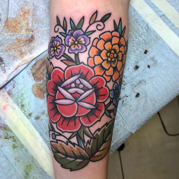 Traditional marigold tattoo 1