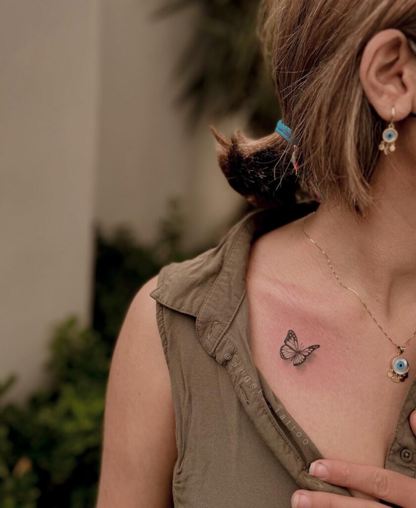 Traditional tattoo: 3d butterfly elegance on the collarbone