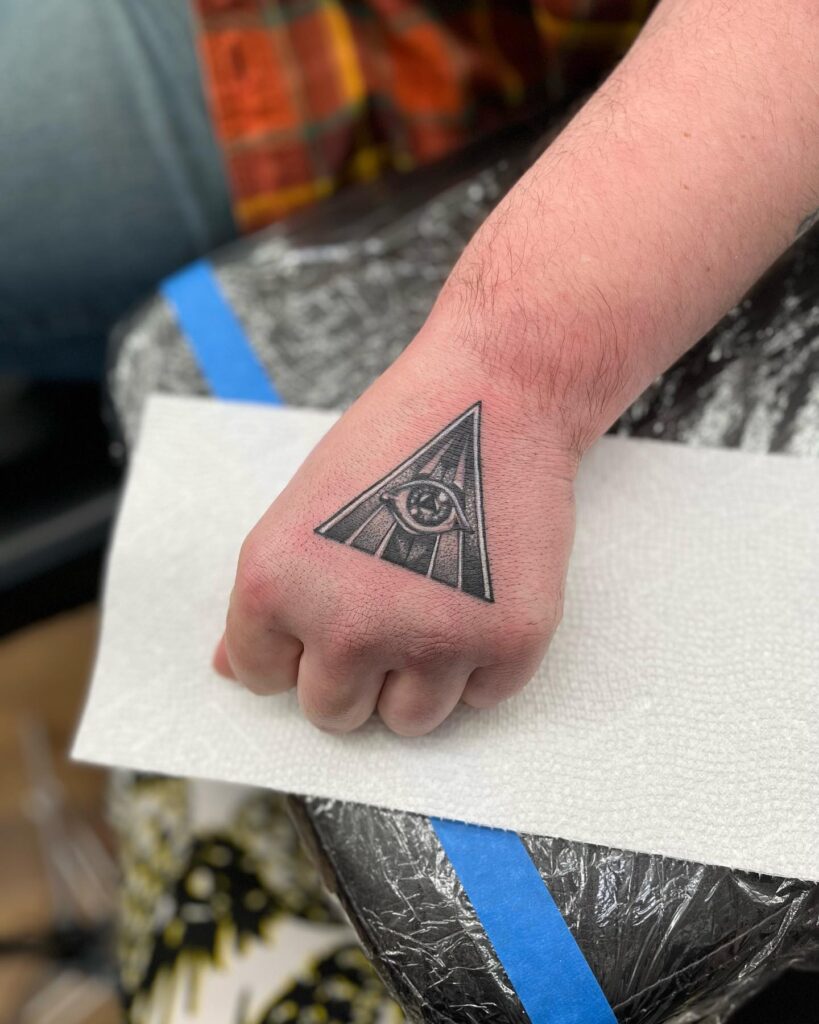 Triangular Eye Tattoo Design On Hand For Men