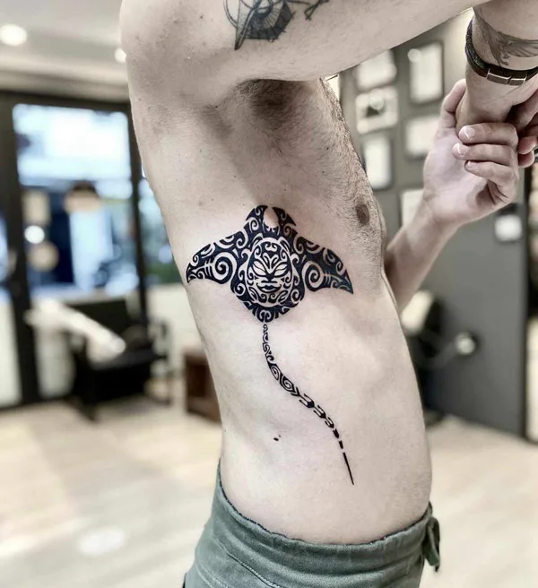 Tribal Stingray Rib Tattoo