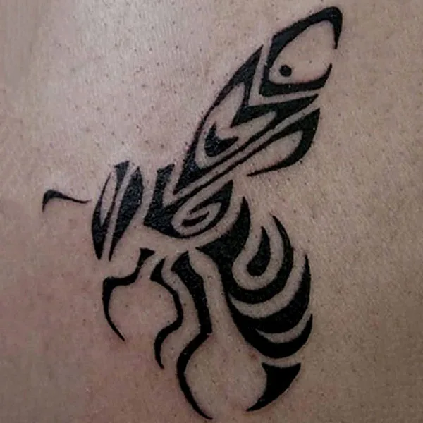Tribal bee tattoo