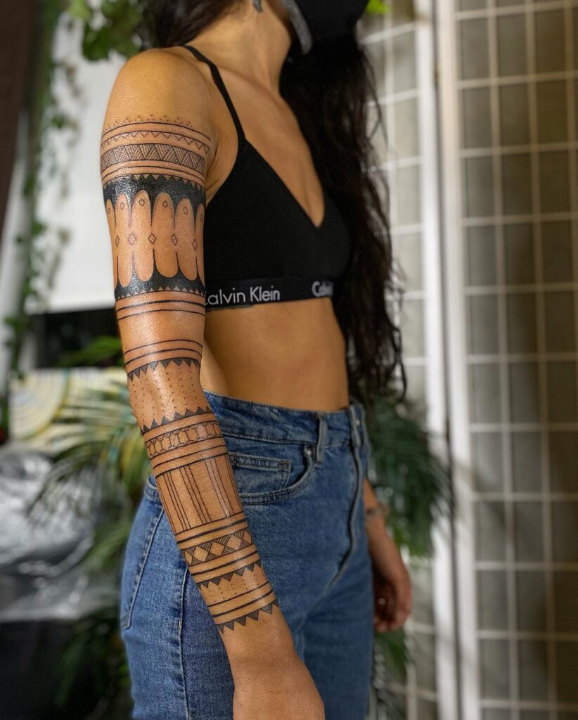 Tribal pride girl's full sleeve filipino tribal tattoo