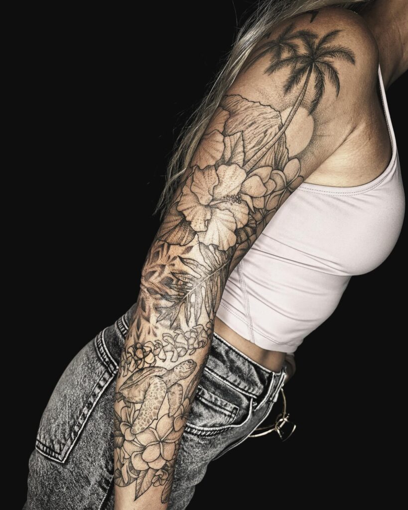 Tropical sleeve tattoo with palm trees, hibiscus, and sea turtle