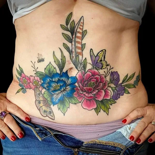 Tummy tuck scar tattoo 3