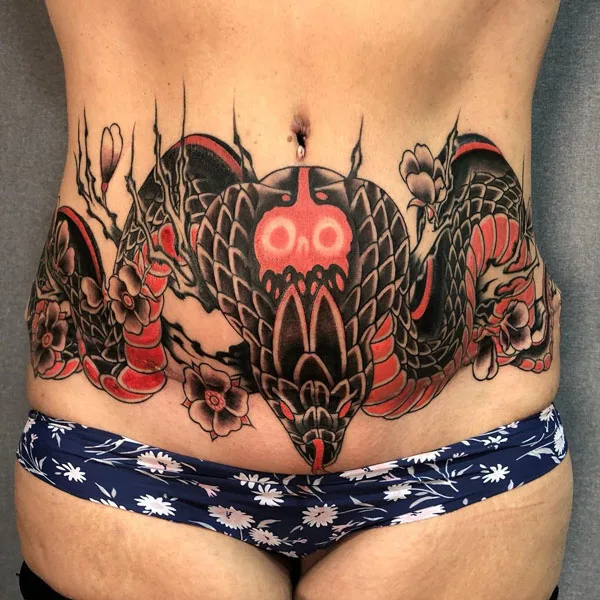 Tummy tuck scar tattoo 9
