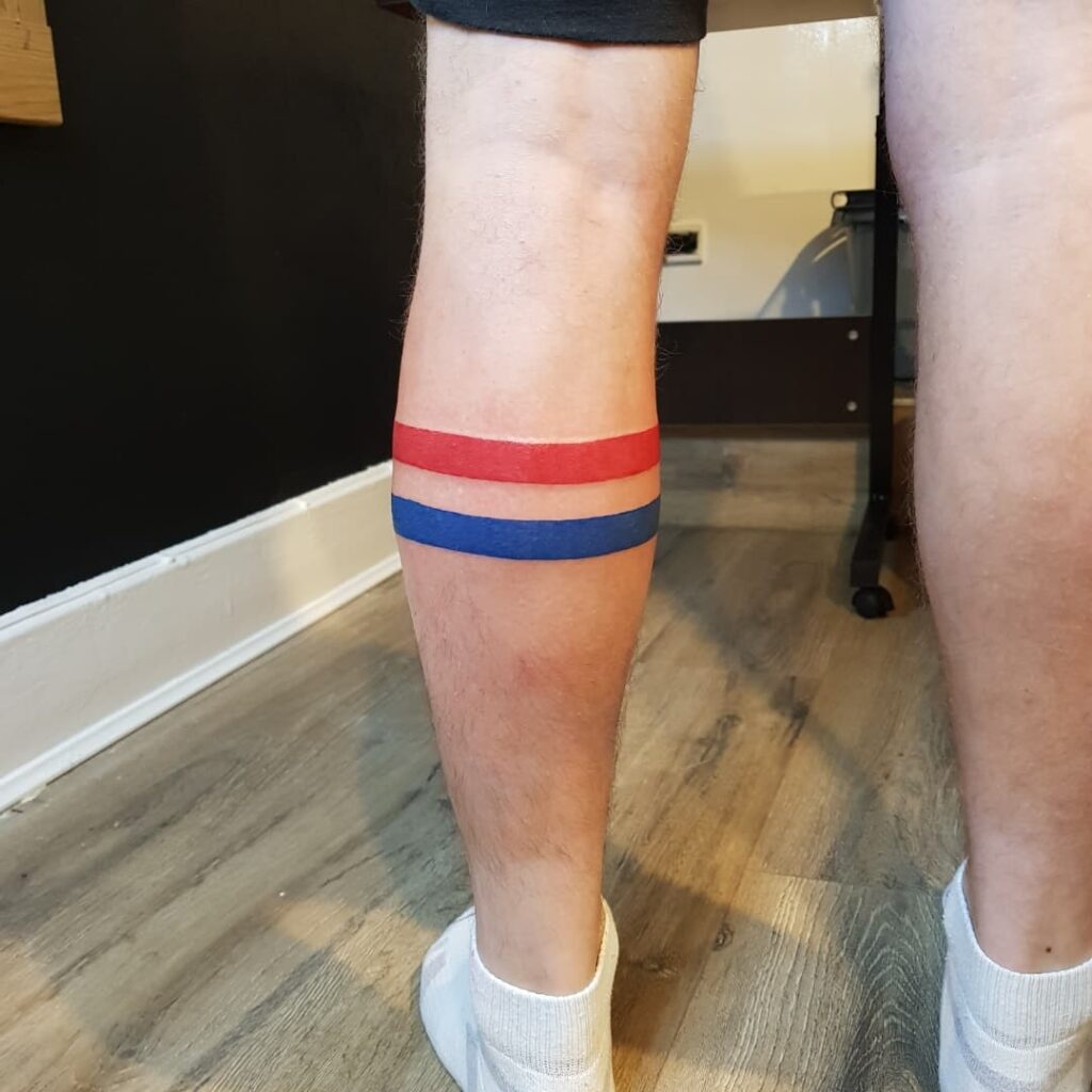 Two-Colored Blue and Red Bands Wrapping Around the Calf: Dual Bands Delight 