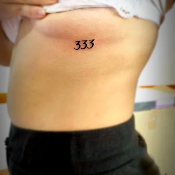 Under boob 333 tattoo
