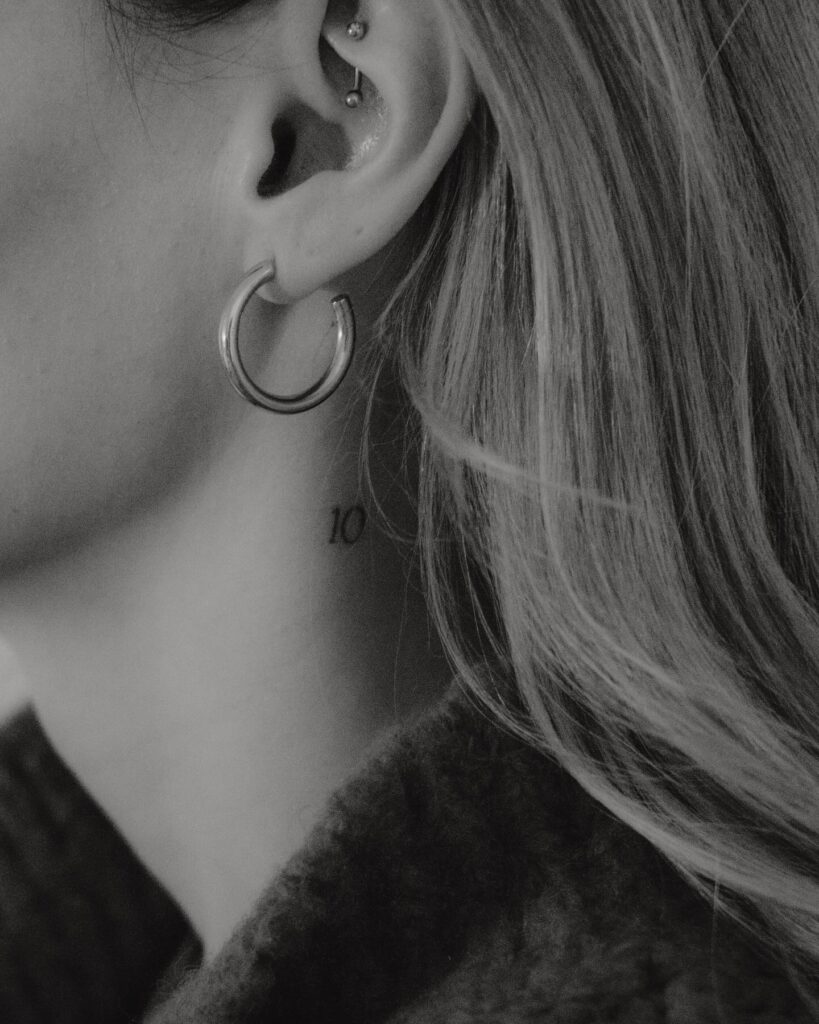 Unique '10' Number Tattoo on the Side of the Neck, a Mini Celebration of Birth and Home: Perfect 10