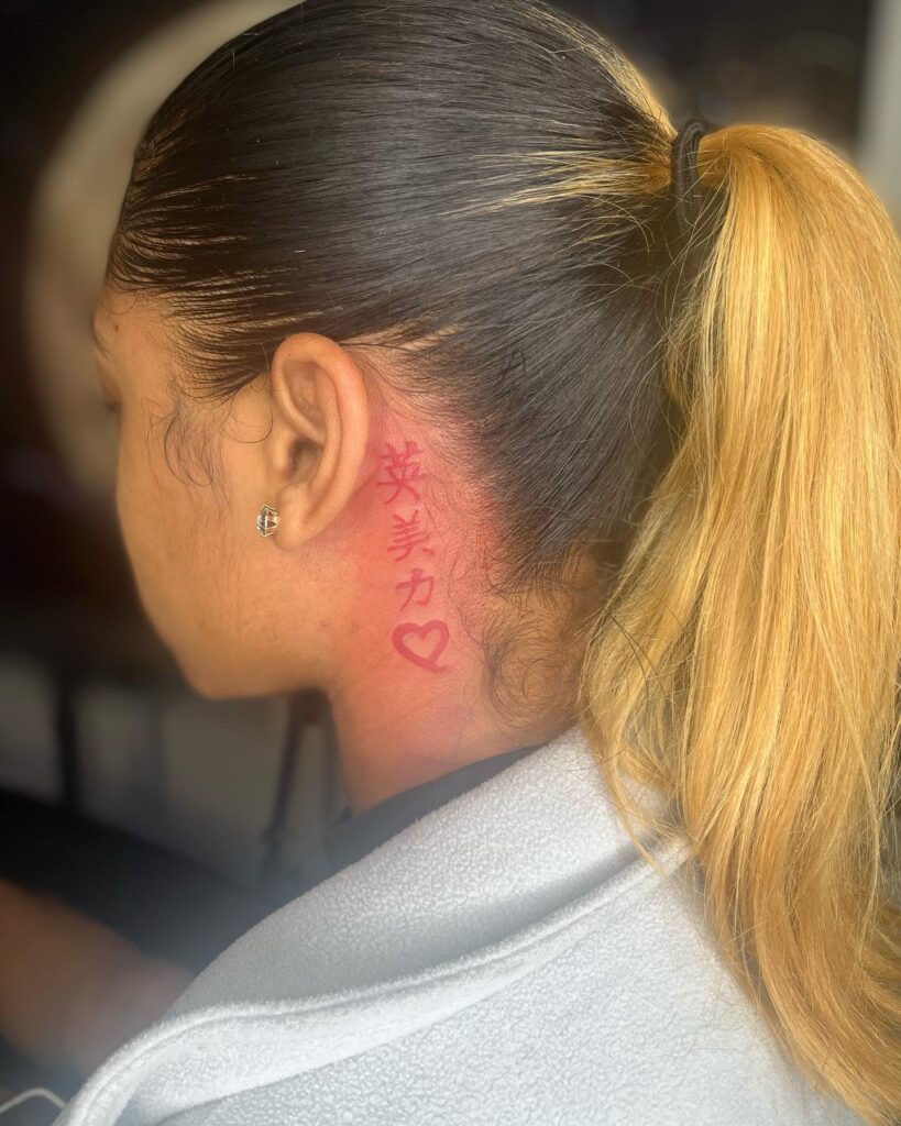 Unique Chinese Tattoo Designs for Women on the Side of the Neck image