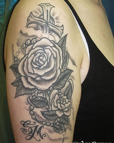 Unique Shoulder Tattoo Big Roses with a Striking Cross for Women