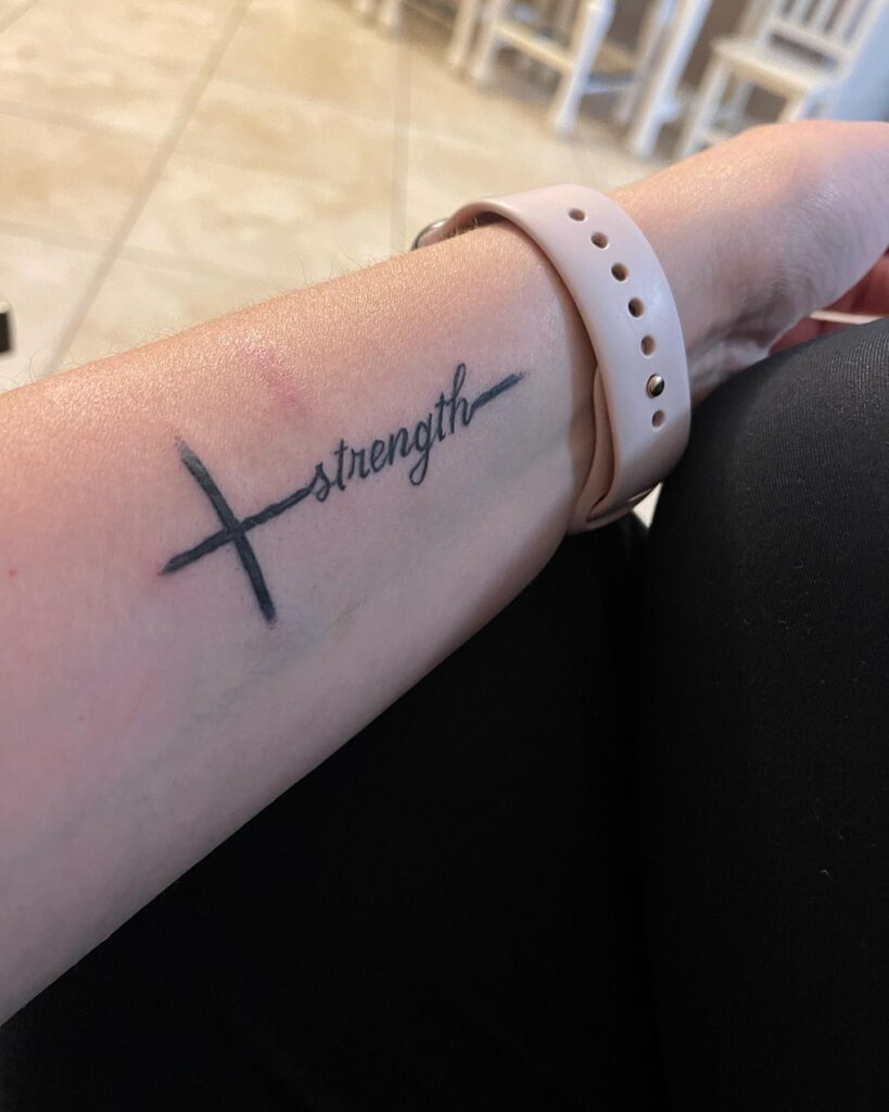 Unique and Classy Strength Text Cross Tattoo with Meaning