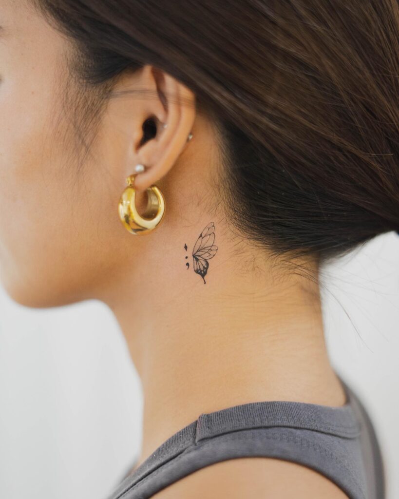 Unique fine line butterfly tattoo behind the ear girls whimsy