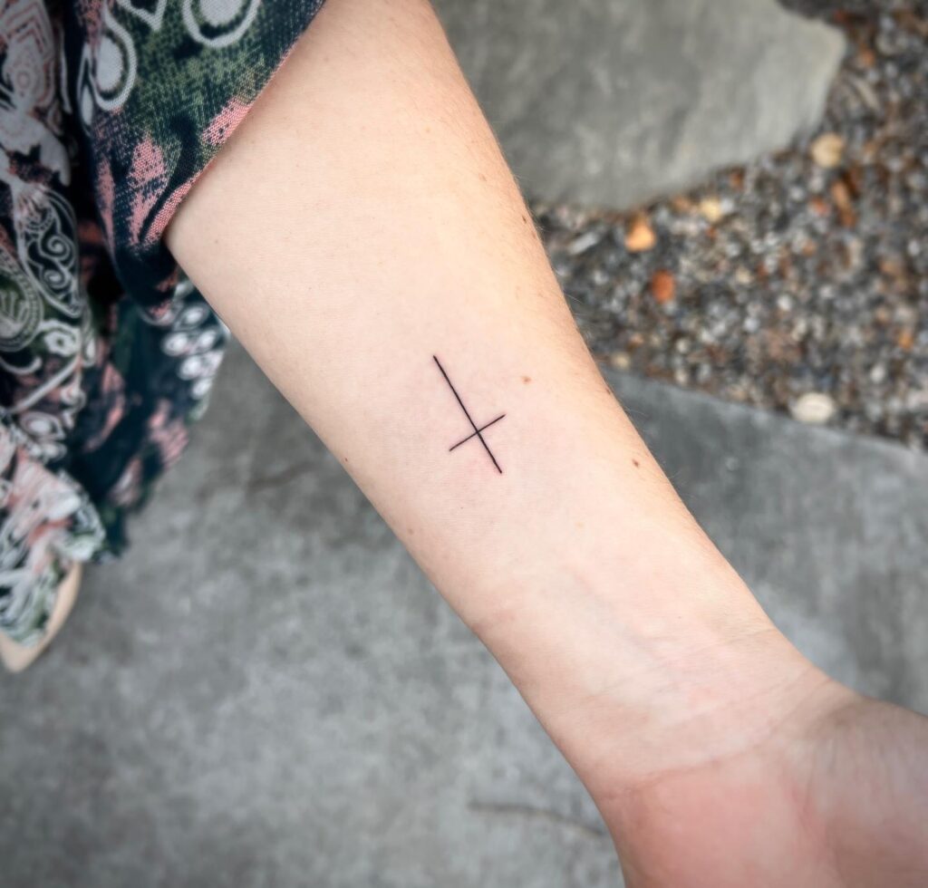Unique inner forearm tattoo ideas cross tattoo girl